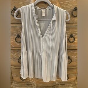 Never worn grey H&M top with liner in size M